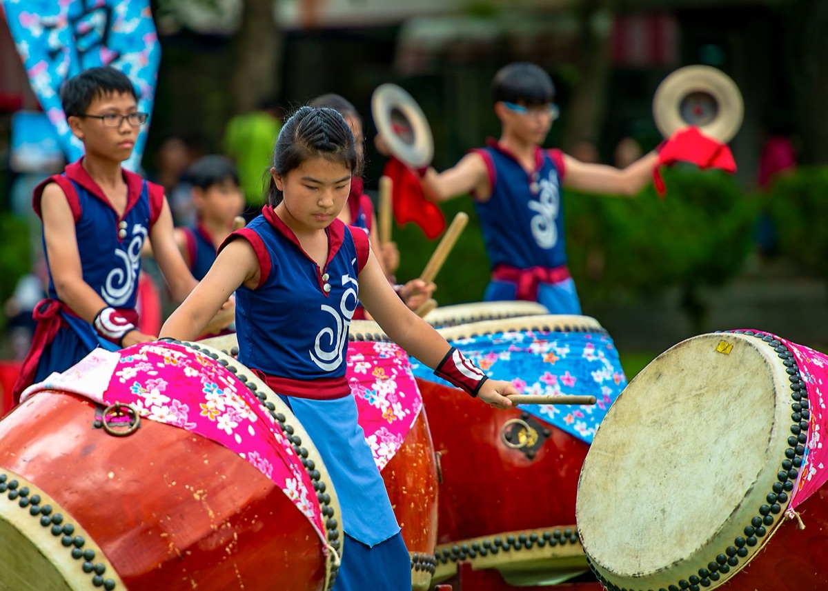 Ryukyu islander playing traditional taiko drum