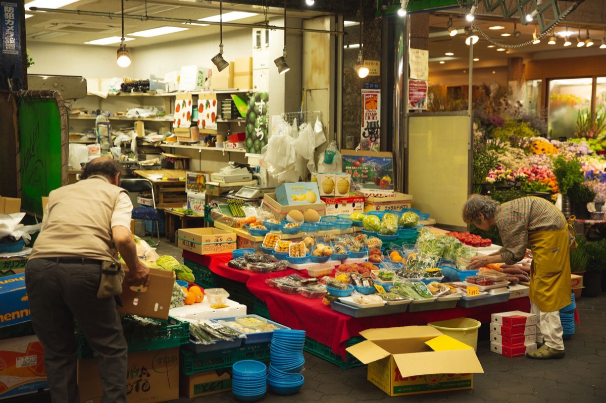 Miya Koji local market with colorful fruits and handmade crafts