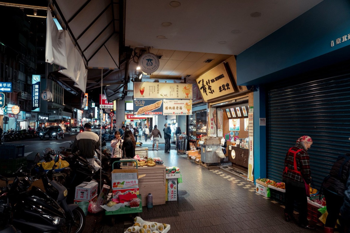 Okinawan street food vendor selling traditional and modernized dishes